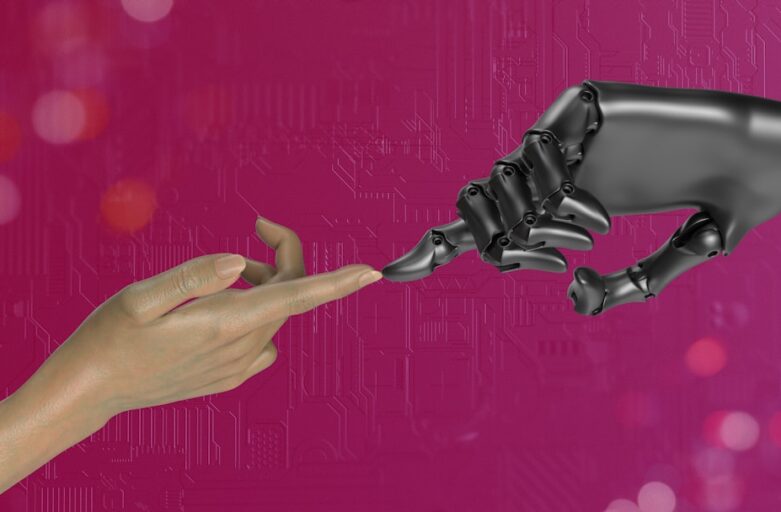 two hands touching each other in front of a pink background