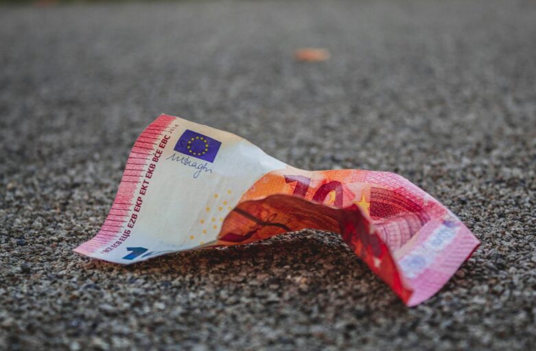 10 banknote on gray surface